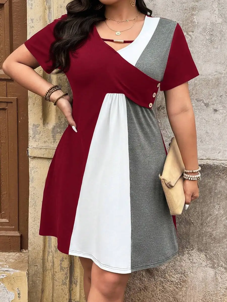 Plus Size Color Block Short Sleeve Casual Dress With Button Detail
Plus Size Color Block Short Sleeve Casual Dress With Button Detail