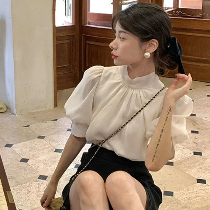 Blouses Women Puff Sleeve Temperament Summer New French Style Loose Casual Mature Folds Design Female Fashion Simple All-match
Blouses Women Puff Sleeve Temperament Summer New French Style Loose Casual Mature Folds Design Female Fashion Simple All-match