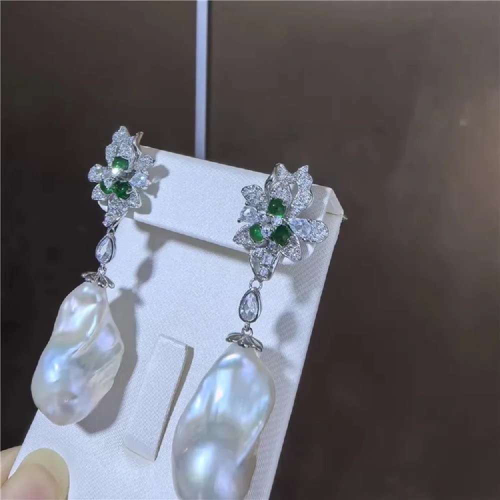 New earrings AAA15-22mm natural Baroque style pearl earrings 925 sterling silver green zircon earrings
New earrings AAA15-22mm natural Baroque style pearl earrings 925 sterling silver green zircon earrings