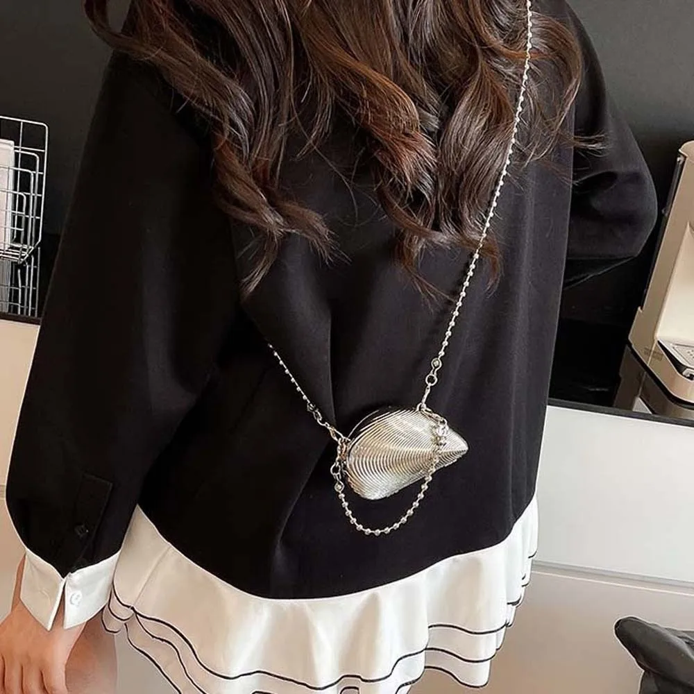 Повседневная элегантная банкетная сумка на цепочке, серебряная 3D женская сумка через плечо, мини-водонепроницаемая сумка с металлическим корпусом, церемония
Повседневная элегантная банкетная сумка на цепочке, серебряная 3D женская сумка через плечо, мини-водонепроницаемая сумка с металлическим корпусом, церемония