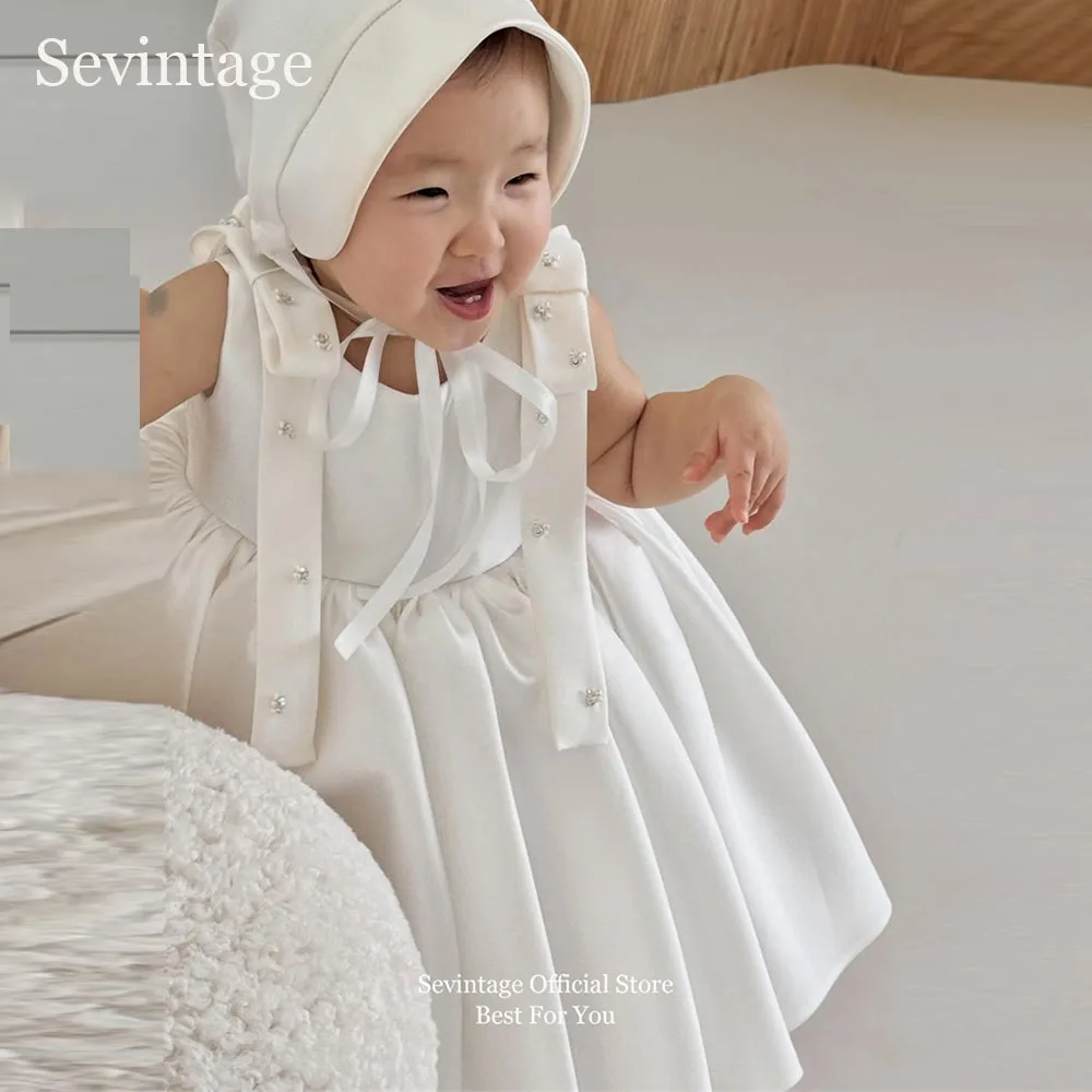 Нежные белые платья для девочек Sevintage с цветочным узором, атласные, с бантом, А-силуэт, корейские свадебные платья для девочек, платья для фотосессий 2026, на заказ
Нежные белые платья для девочек Sevintage с цветочным узором, атласные, с бантом, А-силуэт, корейские свадебные платья для девочек, платья для фотосессий 2026, на заказ