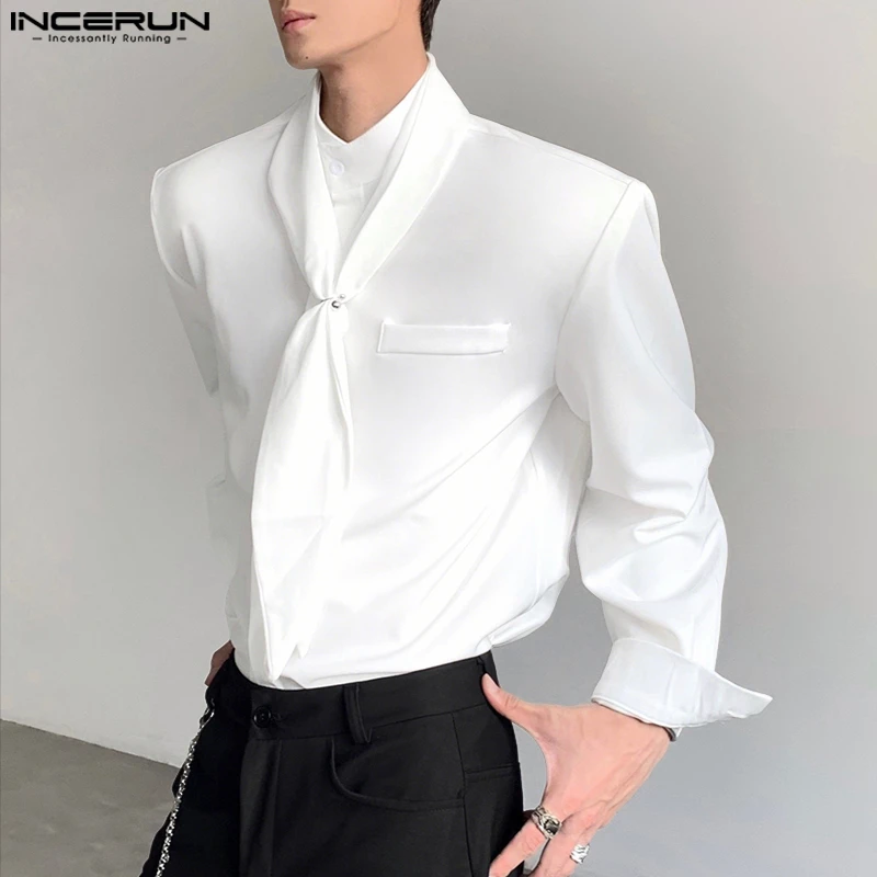 INCERUN Мужская рубашка, однотонная мужская рубашка с воротником-стойкой и длинным рукавом, уличная одежда с галстуком, свободная одежда 2026, модная повседневная мужская одежда
INCERUN Мужская рубашка, однотонная мужская рубашка с воротником-стойкой и длинным рукавом, уличная одежда с галстуком, свободная одежда 2026, модная повседневная мужская одежда