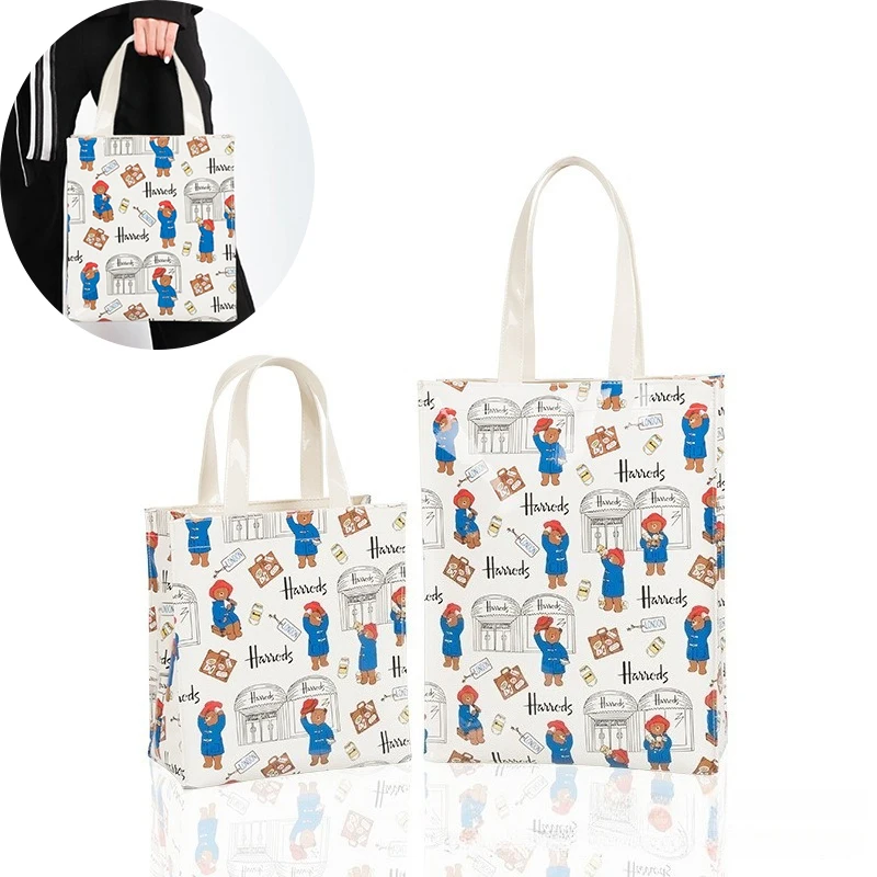 Новая сумка на плечо с принтом Stylemovie Paddington Bear 3, водонепроницаемые сумки-тоут, экологически чистая сумка из ПВХ, модная сумка, сумки Bento
Новая сумка на плечо с принтом Stylemovie Paddington Bear 3, водонепроницаемые сумки-тоут, экологически чистая сумка из ПВХ, модная сумка, сумки Bento