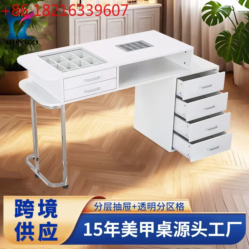White double-layer manicure table with built-in vacuum cleaner and hand rest with 12 compartments of storage.
White double-layer manicure table with built-in vacuum cleaner and hand rest with 12 compartments of storage.