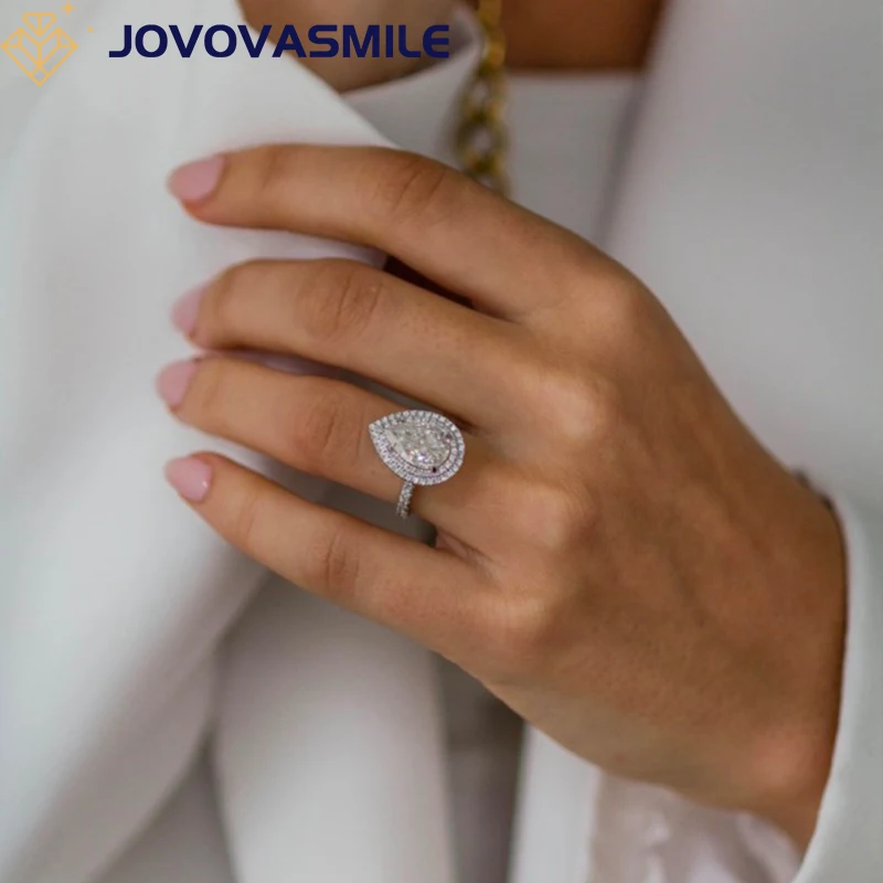 Кольцо JOVOVASMILE из жемчужного муассанита для женщин, 7x11 мм, 3 карата, 9 к, белое золото, кольца с двойным ореолом для женщин, роскошные ювелирные изделия, аксессуары Anelli
Кольцо JOVOVASMILE из жемчужного муассанита для женщин, 7x11 мм, 3 карата, 9 к, белое золото, кольца с двойным ореолом для женщин, роскошные ювелирные изделия, аксессуары Anelli