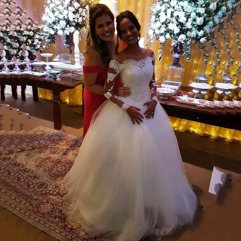 Customized Elegant Long Sleeves A Line Wedding Dresses Beads Appliues Beteau Neck Sweep Train Tulle Lace Up Back Bridal Gowns
Customized Elegant Long Sleeves A Line Wedding Dresses Beads Appliues Beteau Neck Sweep Train Tulle Lace Up Back Bridal Gowns