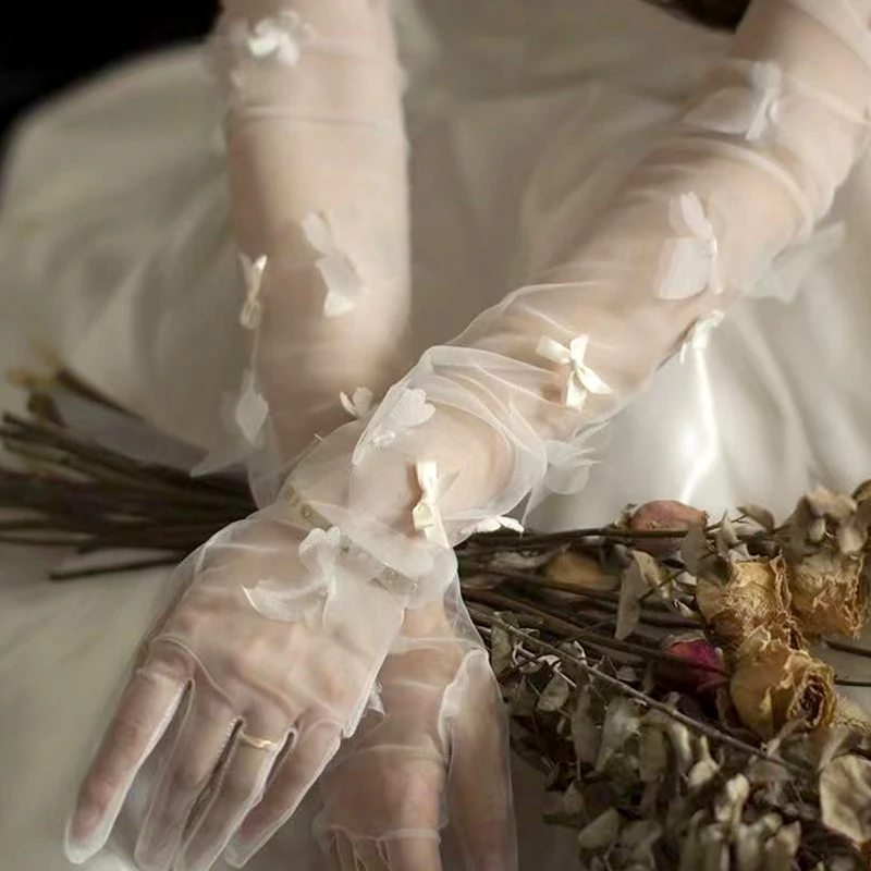 Винтажные прозрачные женские свадебные перчатки, длинные рукавицы с жемчугом и цветочным бантом, сетчатые свадебные аксессуары для выпускного вечера
Винтажные прозрачные женские свадебные перчатки, длинные рукавицы с жемчугом и цветочным бантом, сетчатые свадебные аксессуары для выпускного вечера