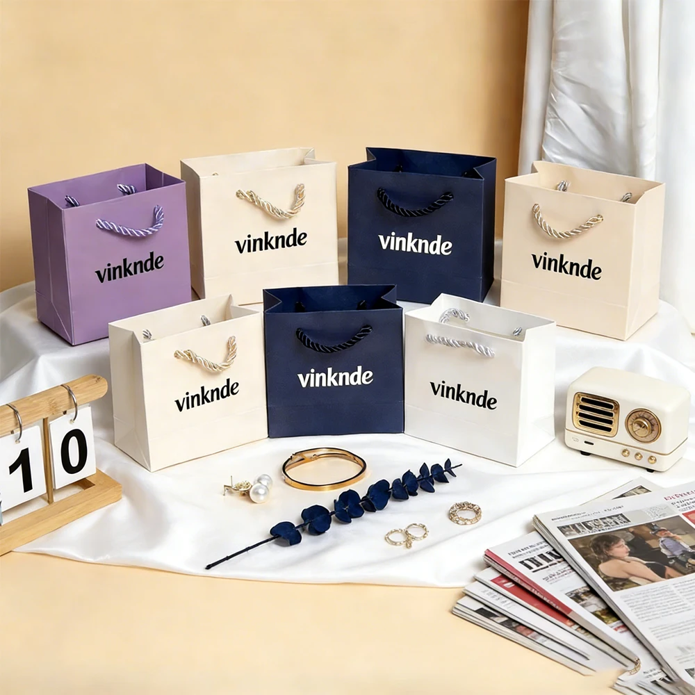 20/50/100 шт. Стильные подарочные пакеты с логотипом на заказ, бежевые и фиолетовые, с ручками, для ювелирных изделий, конфет, косметики, органайзеры для подарков
20/50/100 шт. Стильные подарочные пакеты с логотипом на заказ, бежевые и фиолетовые, с ручками, для ювелирных изделий, конфет, косметики, органайзеры для подарков