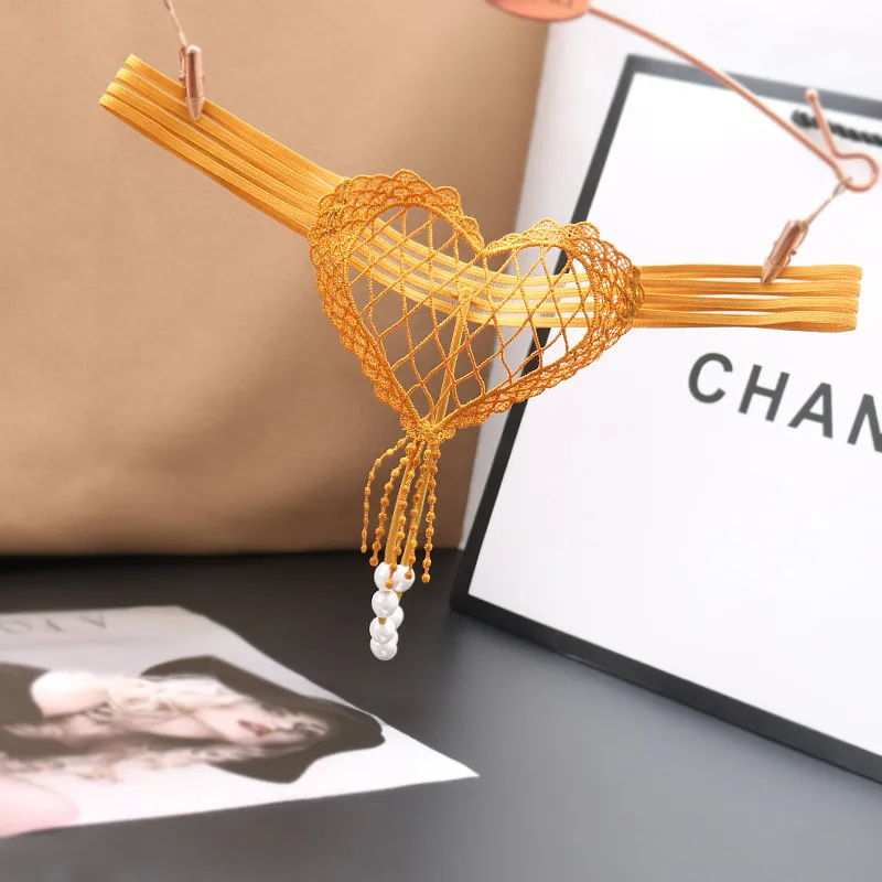 Ladies' Low Waist Pearl Massage Seductive T-shaped Underwear Sexy Heart-shaped Hollow Large Mesh Transparent Thong Panties Women
Ladies' Low Waist Pearl Massage Seductive T-shaped Underwear Sexy Heart-shaped Hollow Large Mesh Transparent Thong Panties Women