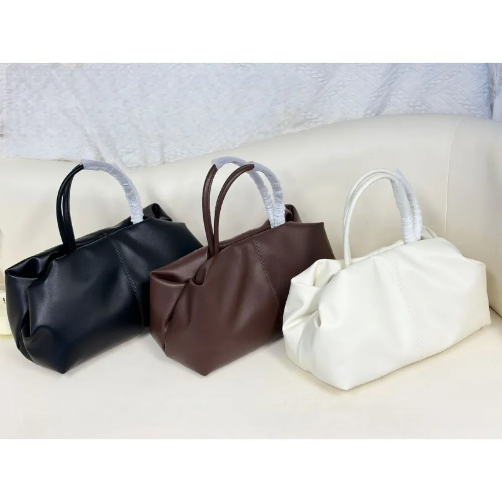 Cloud Bag Large Capacity Versatile Leather Handbag High Sense Light Luxury Pillow Unique Texture Fashion Simple Casual Daily
Cloud Bag Large Capacity Versatile Leather Handbag High Sense Light Luxury Pillow Unique Texture Fashion Simple Casual Daily