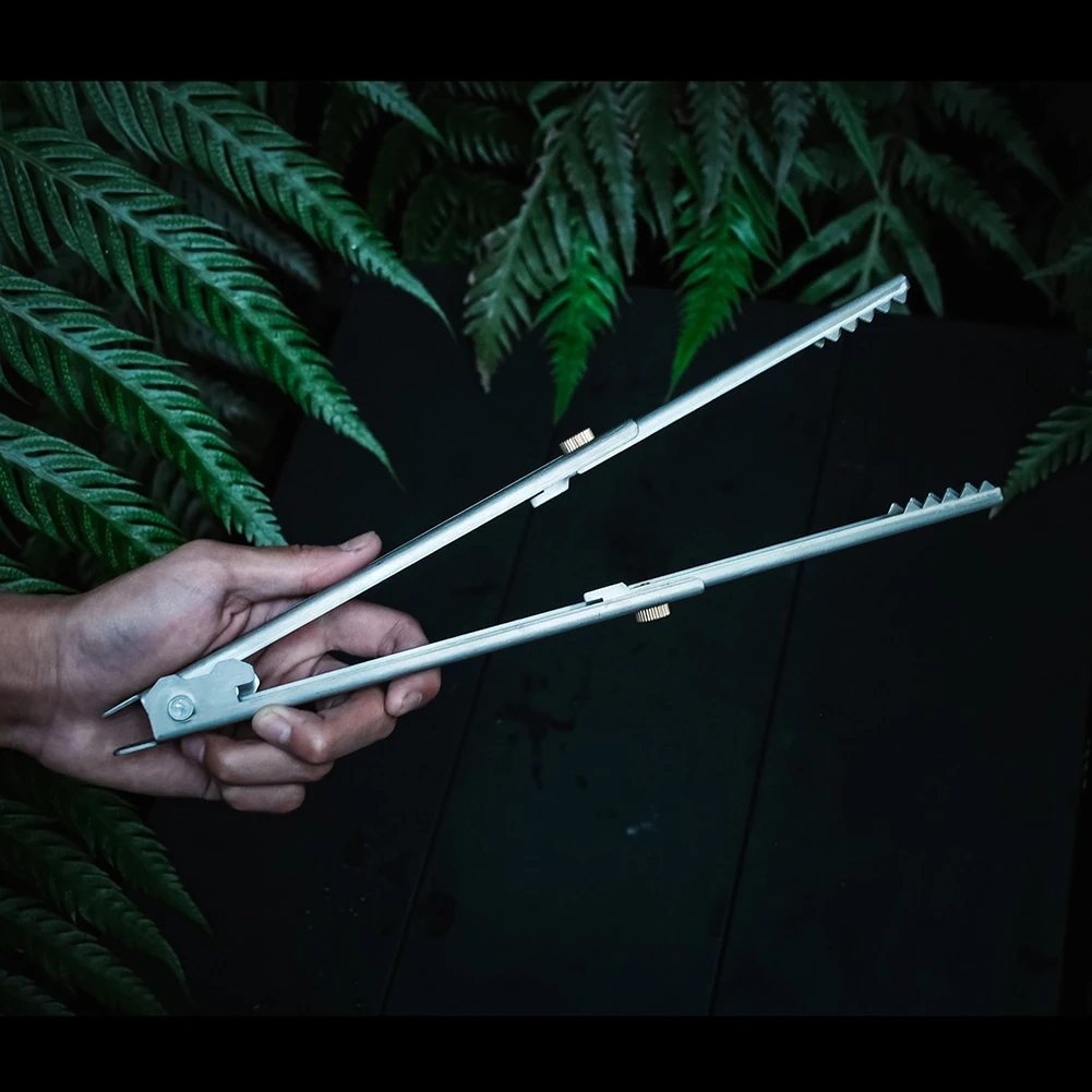 Multi-Functional Titanium BBQ Tongs Expandable Campfire and Charcoal Grabber Clip, Perfect for Outdoor Cooking and Grilling
Multi-Functional Titanium BBQ Tongs Expandable Campfire and Charcoal Grabber Clip, Perfect for Outdoor Cooking and Grilling