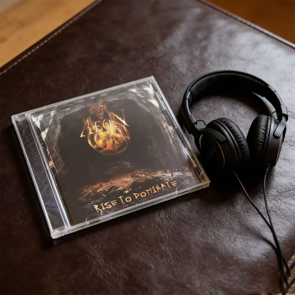 CD This Is The Album "Rise To Dominate" By The Swedish Technical Death Metal Band Aeon. The Cover Features A Dark Background
CD This Is The Album "Rise To Dominate" By The Swedish Technical Death Metal Band Aeon. The Cover Features A Dark Background