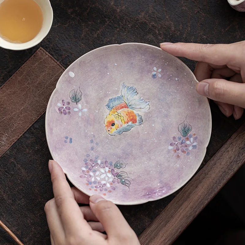 Creative Goldfish Purple Scale Hand-painted Ceramic Pot Holder Household Tea Tray, Pot Holder, Small Chinese Style Fruit Plate
Creative Goldfish Purple Scale Hand-painted Ceramic Pot Holder Household Tea Tray, Pot Holder, Small Chinese Style Fruit Plate