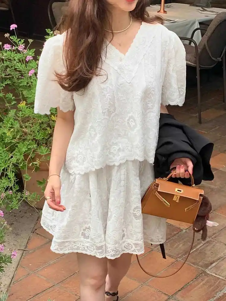 Clothland WomenSweet White Black Lace Suit V Neck Short Sleeve Shirt Elastic Waist Mini Shorts Fashion Two Piece Set TA615
Clothland WomenSweet White Black Lace Suit V Neck Short Sleeve Shirt Elastic Waist Mini Shorts Fashion Two Piece Set TA615