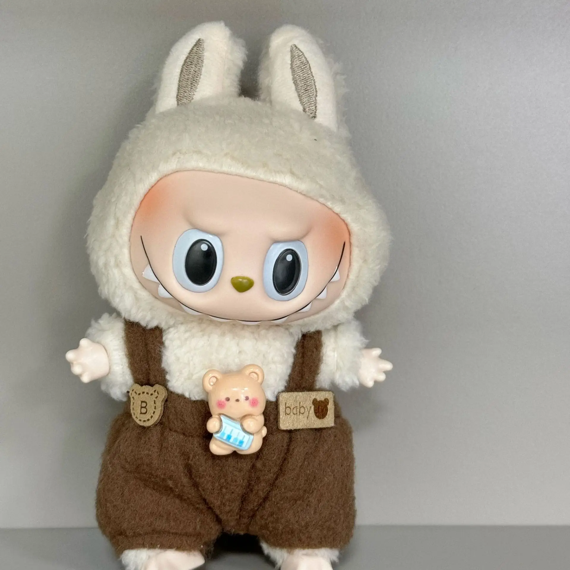 For 15-17cm Labubu Doll Clothes Pendant Party Cute Coffee Colored Overalls Set Clothing
For 15-17cm Labubu Doll Clothes Pendant Party Cute Coffee Colored Overalls Set Clothing