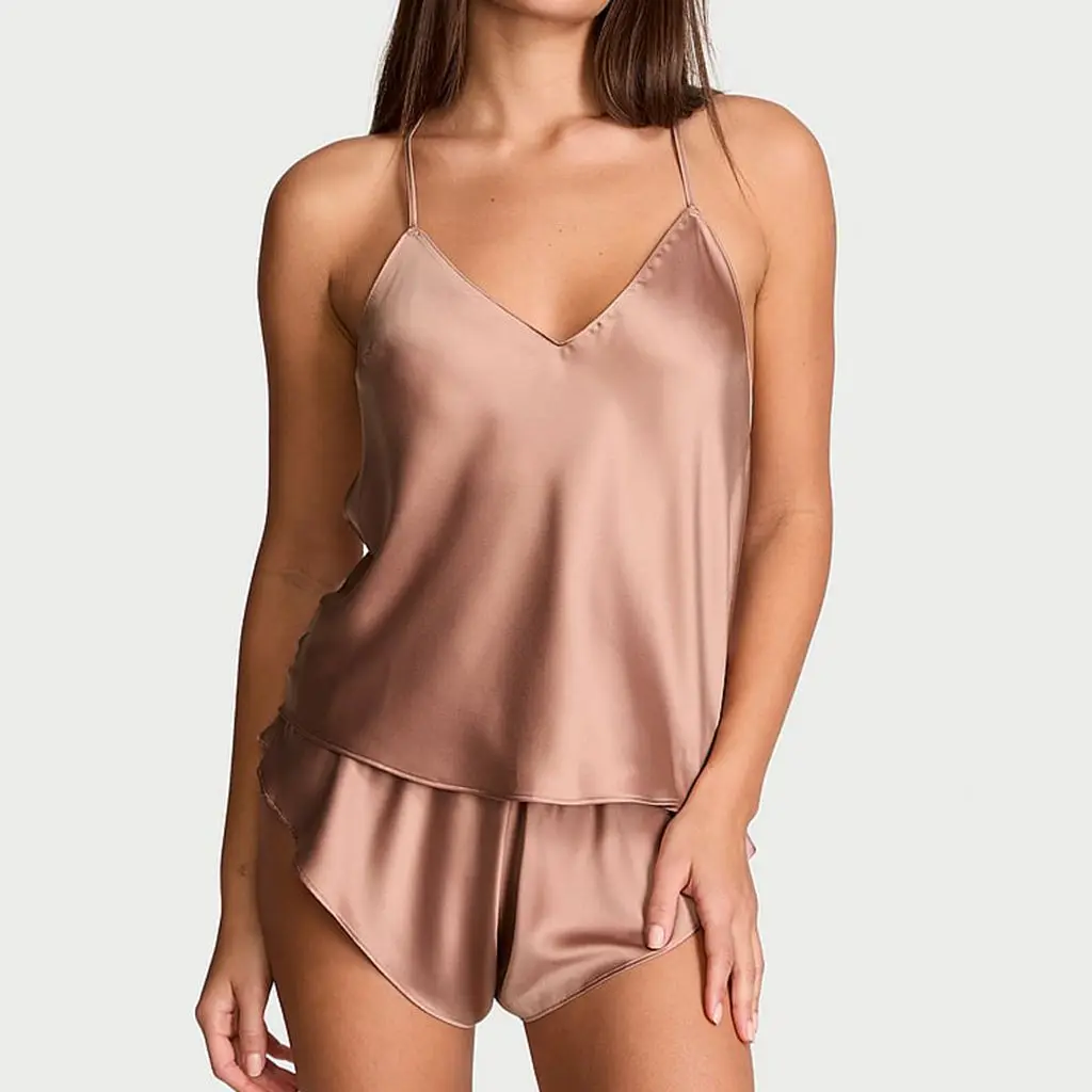 HEZIOWYUN Women's Luxurious Satin Pajamas Set Lace-up Cross Backless V-Neck Camis Vest Tops + Elastic Waist Ruffled Sleep Shorts
HEZIOWYUN Women's Luxurious Satin Pajamas Set Lace-up Cross Backless V-Neck Camis Vest Tops + Elastic Waist Ruffled Sleep Shorts