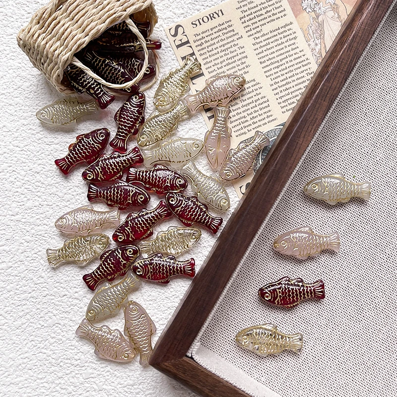 Prague glass double-sided small fish carp gold tracing retro antique antique made loose beads DIY handmade bead phone chain acce
Prague glass double-sided small fish carp gold tracing retro antique antique made loose beads DIY handmade bead phone chain acce