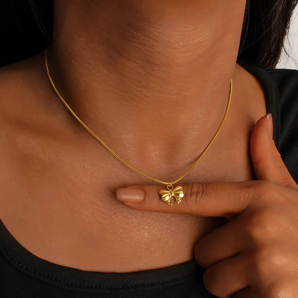 DIY accessories Guangdong jewelry ins style bow pendant necklace fashion trend stainless steel 18K gold snake bone chain neck ch
DIY accessories Guangdong jewelry ins style bow pendant necklace fashion trend stainless steel 18K gold snake bone chain neck ch