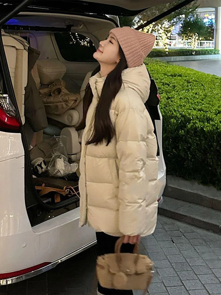 Black Hooded Cotton Jacket Women's Winter Thick Outerwear Bread Style Coat Medium Length Korean Version Loose Fit Zipper
Black Hooded Cotton Jacket Women's Winter Thick Outerwear Bread Style Coat Medium Length Korean Version Loose Fit Zipper
