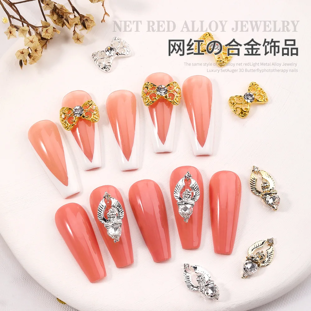 20Pcs/Lot Nail Art Jewelry Wholesale Hollow Bow Knot Diamond Retro Hollow Metal Angel Decoration For Nail Grooming Accessories
20Pcs/Lot Nail Art Jewelry Wholesale Hollow Bow Knot Diamond Retro Hollow Metal Angel Decoration For Nail Grooming Accessories