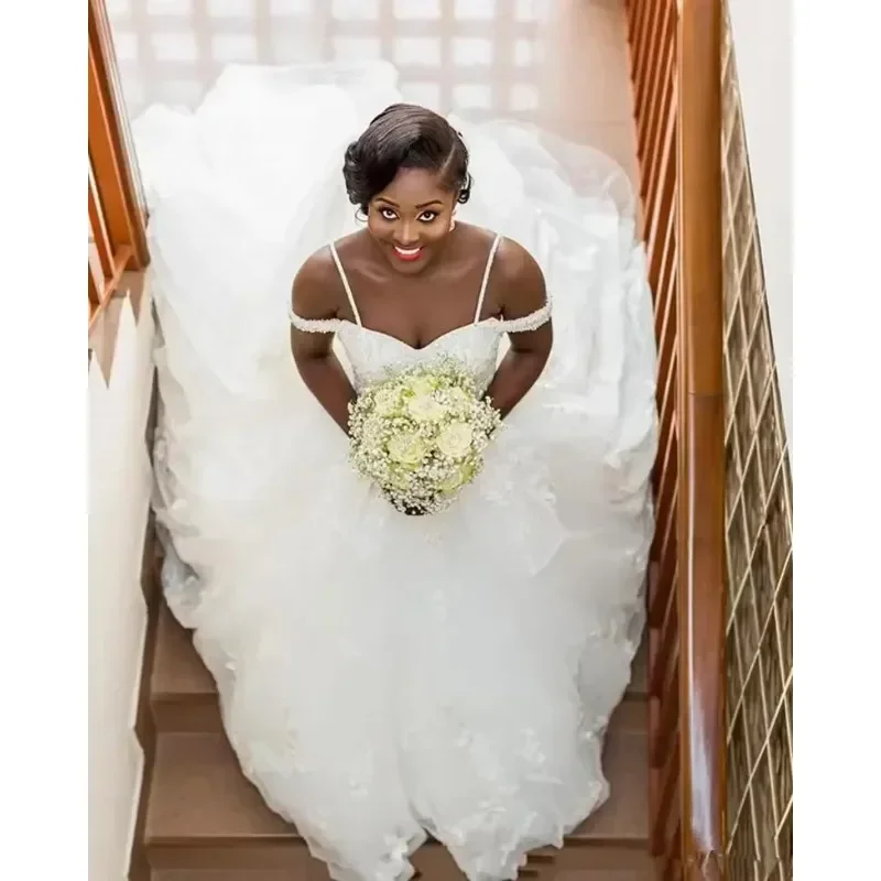 Customized South African Arabic Ball Wedding Dresses Luxurious Pearls Beaded Spaghetti Straps Bridal Gowns Backless Plus Size
Customized South African Arabic Ball Wedding Dresses Luxurious Pearls Beaded Spaghetti Straps Bridal Gowns Backless Plus Size