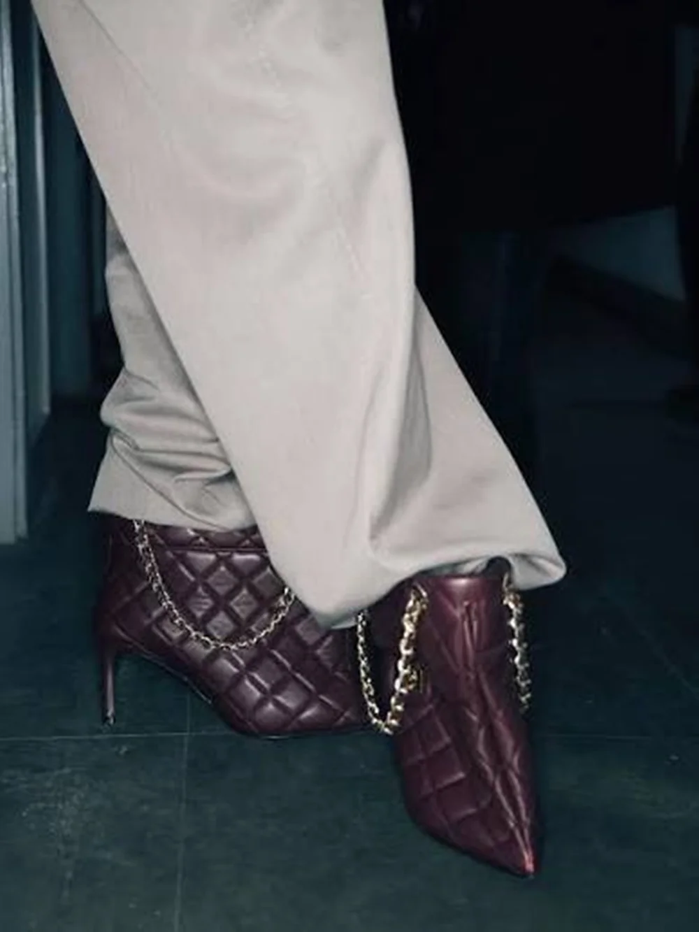 Dark Leather Pointed Toe Stiletto Ankle Boots Unique Handbag-Style Design Gold Chain Strap Thin High Heel Runway Looks
Dark Leather Pointed Toe Stiletto Ankle Boots Unique Handbag-Style Design Gold Chain Strap Thin High Heel Runway Looks