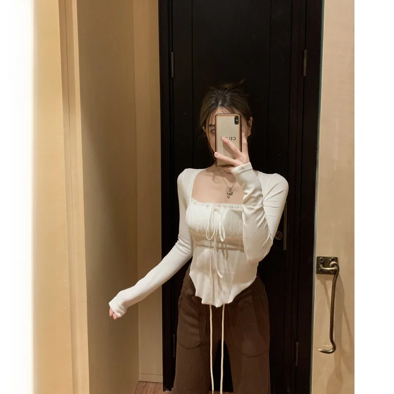 Белая женская футболка с длинным рукавом и квадратным вырезом, облегающая, весенняя, базовая, с дизайнерскими вставками, топ для женщин
Белая женская футболка с длинным рукавом и квадратным вырезом, облегающая, весенняя, базовая, с дизайнерскими вставками, топ для женщин