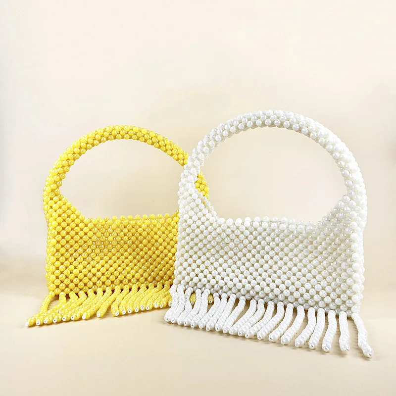Minimalist Design Simple Solid Color Pearl Tassel Handbags for Women New Ins Cute Handmade Woven Beaded Women's Shoulder Bag
Minimalist Design Simple Solid Color Pearl Tassel Handbags for Women New Ins Cute Handmade Woven Beaded Women's Shoulder Bag