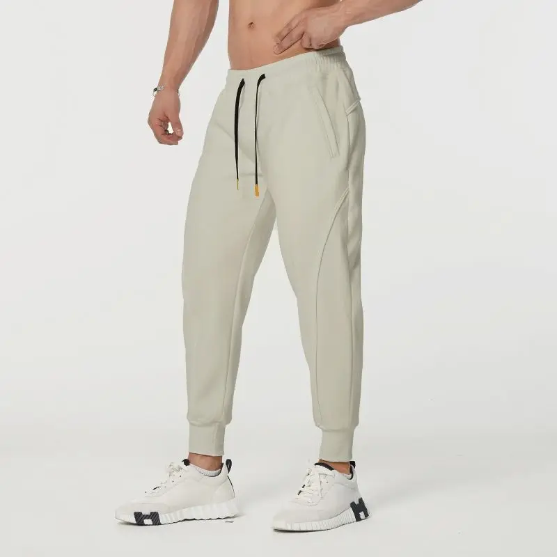 Spring and Autumn Sports Leisure Commuting Cotton Training Running Basketball Strap Foot Guard Pants for Men
Spring and Autumn Sports Leisure Commuting Cotton Training Running Basketball Strap Foot Guard Pants for Men