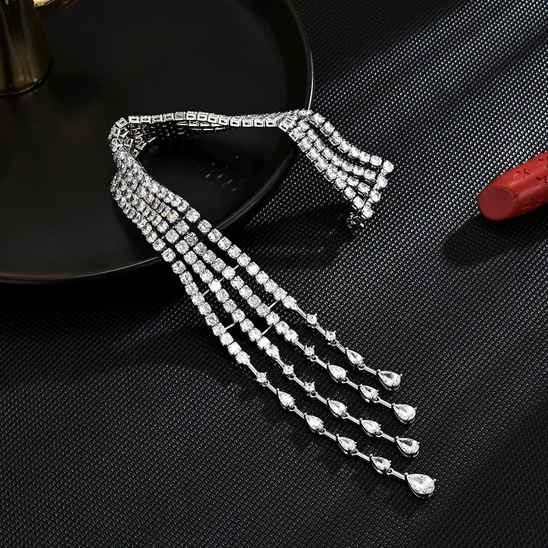 High-End Exquisite Shooting Star Brooch Elegant Temperament Luxury Zircon Diamond Long Flowing Tassel Shoulder Accessories Pins
High-End Exquisite Shooting Star Brooch Elegant Temperament Luxury Zircon Diamond Long Flowing Tassel Shoulder Accessories Pins