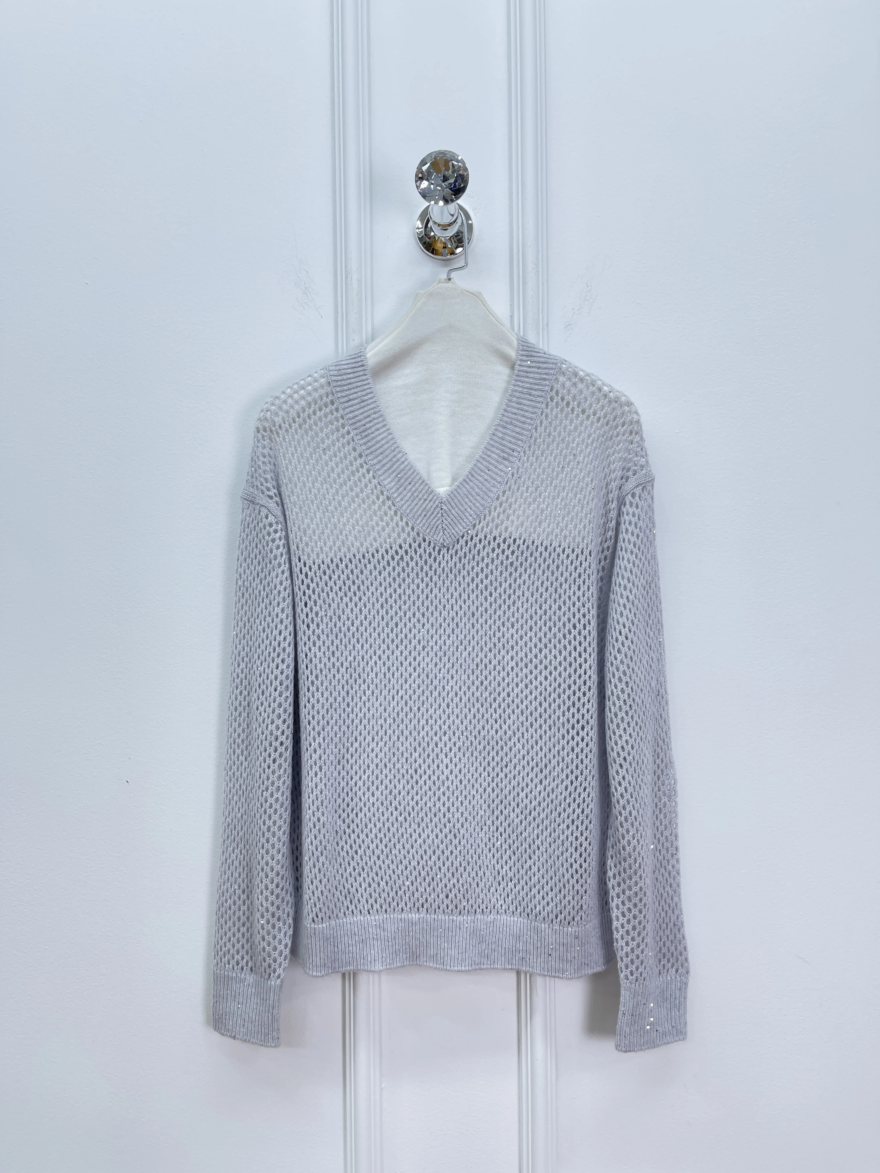 Spring And Summer New High-Quality Fashion Casual Sequin Yarn V-Neck Hollow Knit Sweater For Women
Spring And Summer New High-Quality Fashion Casual Sequin Yarn V-Neck Hollow Knit Sweater For Women