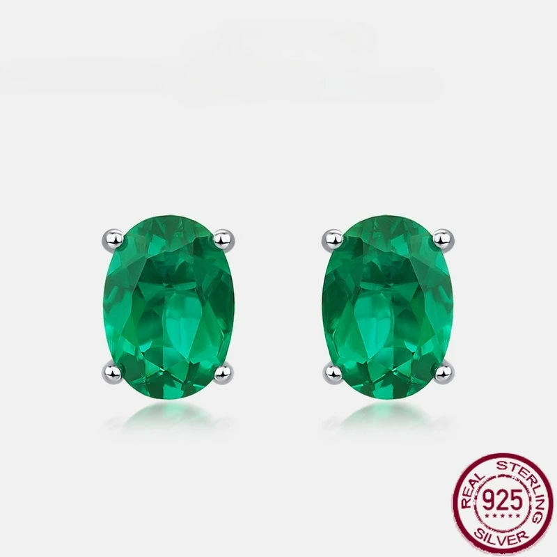 New S925 pure silver egg shaped emerald claws with colorful earrings, European and American simple and luxurious wedding jewelry 
New S925 pure silver egg shaped emerald claws with colorful earrings, European and American simple and luxurious wedding jewelry
