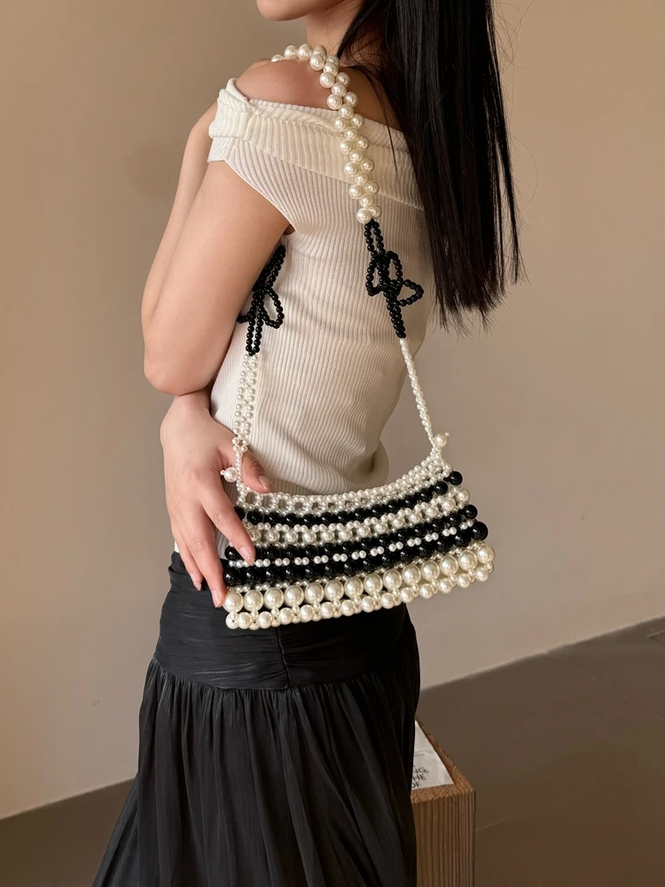 Handcrafted Knot Flower Chain 2024 Women's Crossbody Phone Bag Pearl Beaded Woven Bag Casual Summer round Bag
Handcrafted Knot Flower Chain 2024 Women's Crossbody Phone Bag Pearl Beaded Woven Bag Casual Summer round Bag