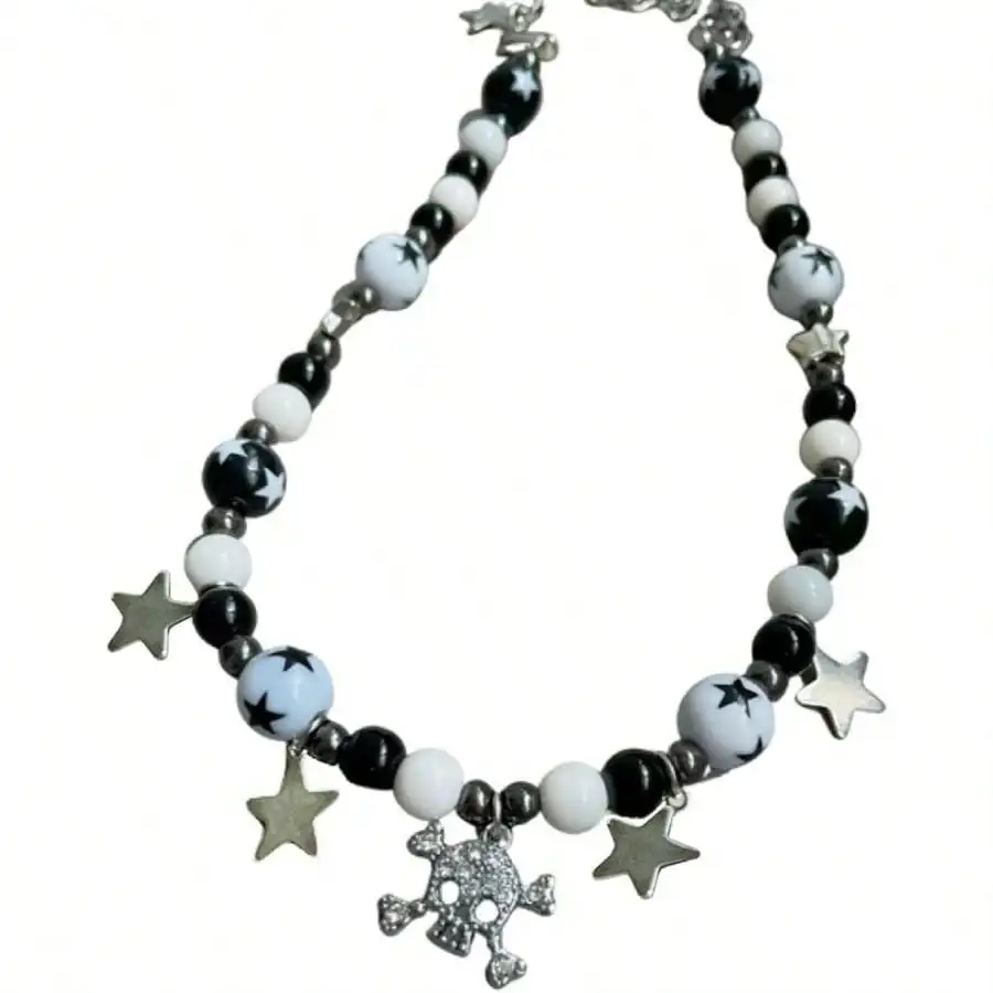 Black and White Beaded Necklace with Star Charms and Skull Pendant
Black and White Beaded Necklace with Star Charms and Skull Pendant
