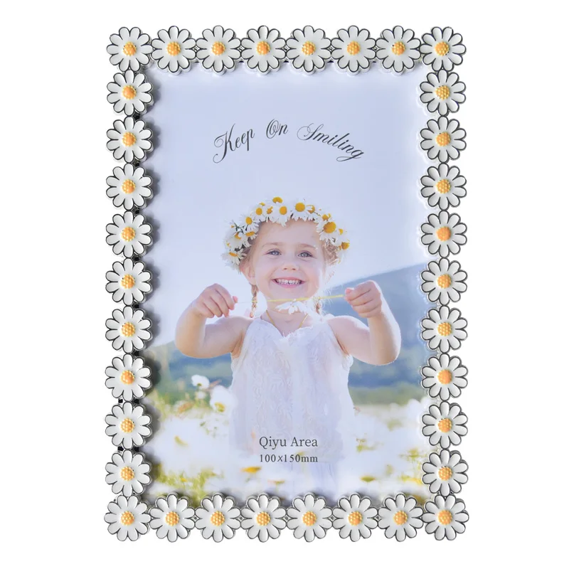 Shiny Silver Plating Daisy Metal Photo Frame With White Yellow Hand Enameled In Round Rectangle Shape For Home Tabletop Display
Shiny Silver Plating Daisy Metal Photo Frame With White Yellow Hand Enameled In Round Rectangle Shape For Home Tabletop Display