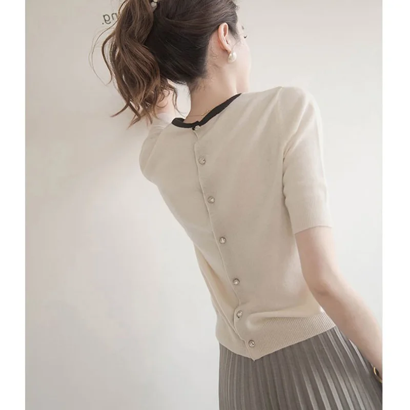 Женская футболка с круглым вырезом и узлом, из ледяного шелка, вязаная, с коротким рукавом, модная, с защитой от солнца, свободного кроя, с пуговицами
Женская футболка с круглым вырезом и узлом, из ледяного шелка, вязаная, с коротким рукавом, модная, с защитой от солнца, свободного кроя, с пуговицами