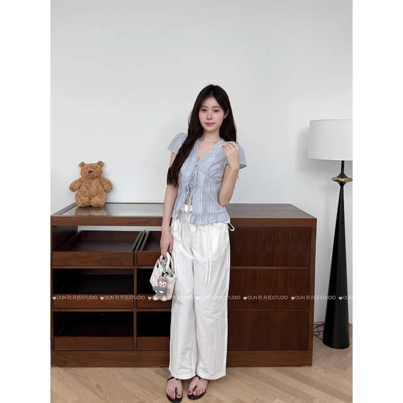 Women's Striped Tie Front Blouse V-Neck with Ruffle Hem Cap Sleeves
Women's Striped Tie Front Blouse V-Neck with Ruffle Hem Cap Sleeves