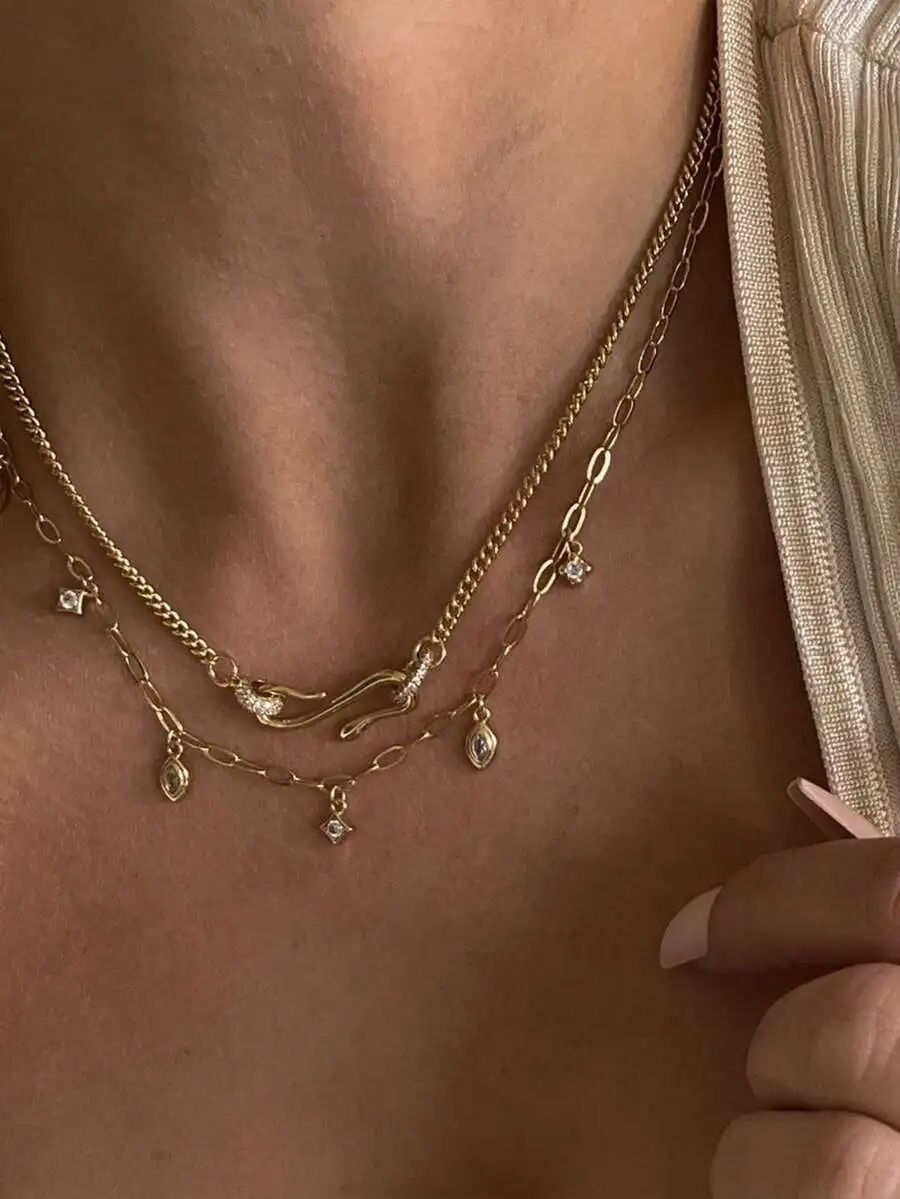 Elegant Gold-Tone Stainless Steel Multi-Layer Choker With Sparkling Zirconia Charms For Women’s Evening And Bridal Wear
Elegant Gold-Tone Stainless Steel Multi-Layer Choker With Sparkling Zirconia Charms For Women’s Evening And Bridal Wear
