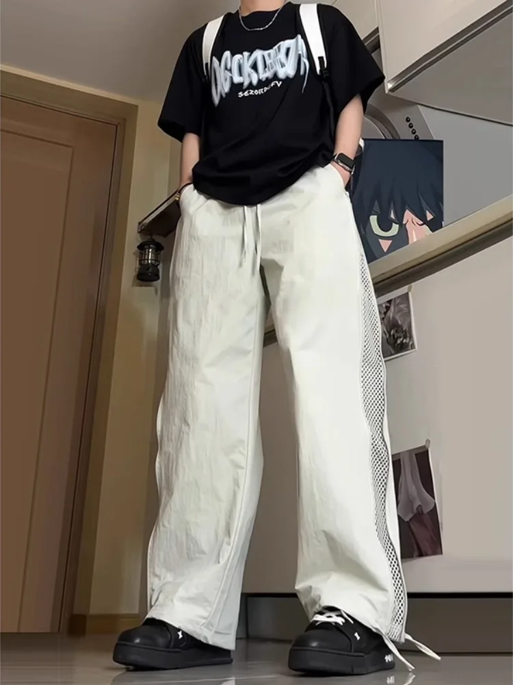 Мужские летние брюки American Sle Ice Silk Qui Dry с боковой молнией, свободные прямые брюки для парашютного спорта и альпинизма
Мужские летние брюки American Sle Ice Silk Qui Dry с боковой молнией, свободные прямые брюки для парашютного спорта и альпинизма