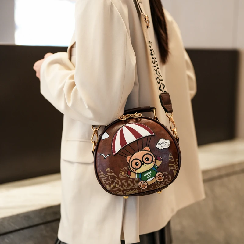 Toposhine Women's Cute Cartoon Crossbody Handbag with Detachable Strap for Daily Use Kawaii Panda Lili Parachute Print Round Bag
Toposhine Women's Cute Cartoon Crossbody Handbag with Detachable Strap for Daily Use Kawaii Panda Lili Parachute Print Round Bag