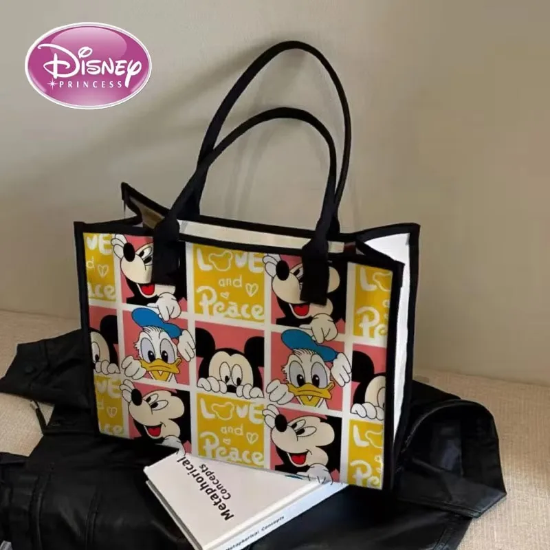 Disney 2025 New Cartoon Mickey Mouse Large-capacity Canvas Bag College Student Class Bag Commuting Mommy Bag
Disney 2025 New Cartoon Mickey Mouse Large-capacity Canvas Bag College Student Class Bag Commuting Mommy Bag