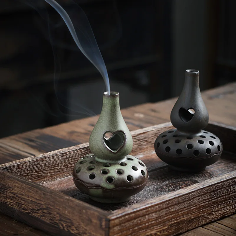 Vintage gourd sandalwood incense burner ceramic tower base small auspicious cloud incense burner Zen incense burner decoration
Vintage gourd sandalwood incense burner ceramic tower base small auspicious cloud incense burner Zen incense burner decoration