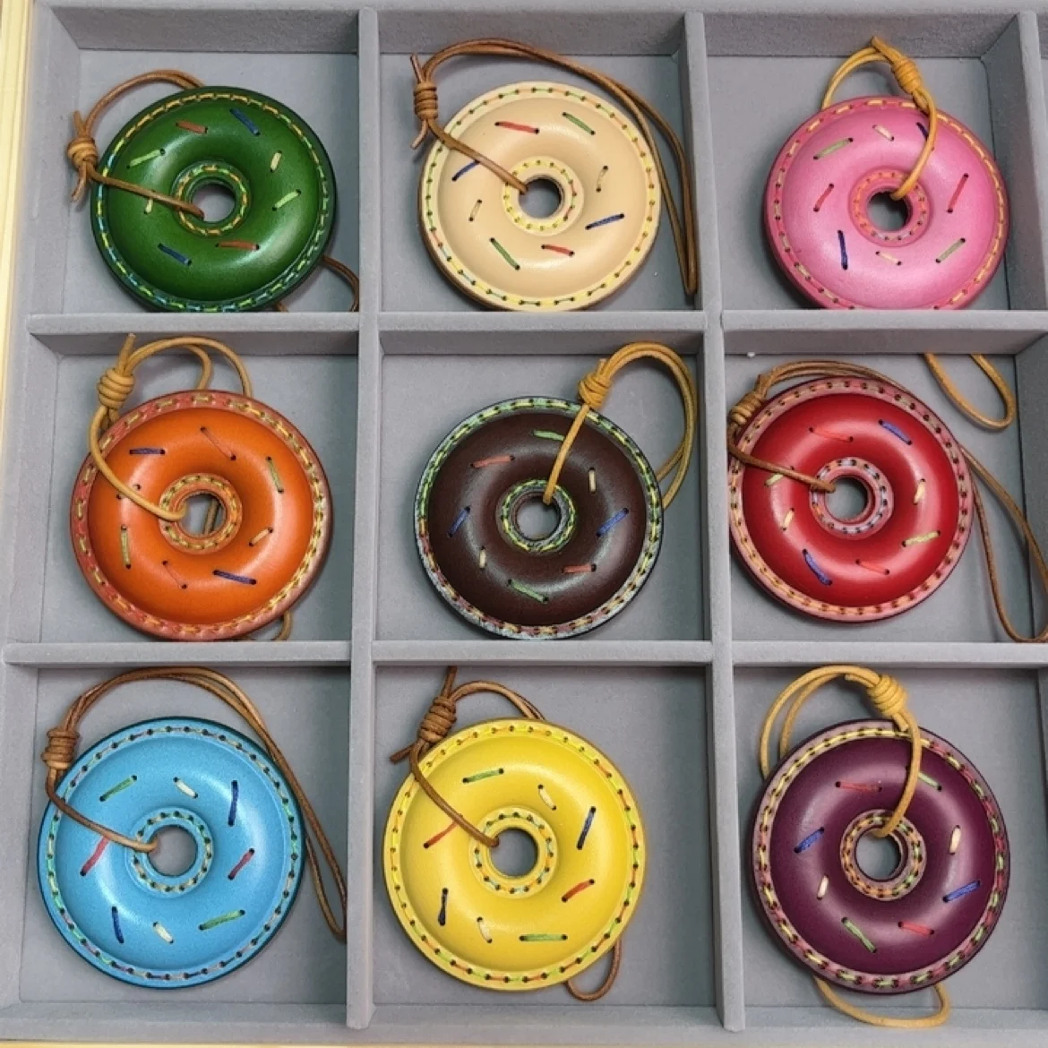 Handmade Donut Charm Keychain - Genuine Leather Colorful Gift, Car Mirror Hanger, Purse/Bag Accessory Decor
Handmade Donut Charm Keychain - Genuine Leather Colorful Gift, Car Mirror Hanger, Purse/Bag Accessory Decor