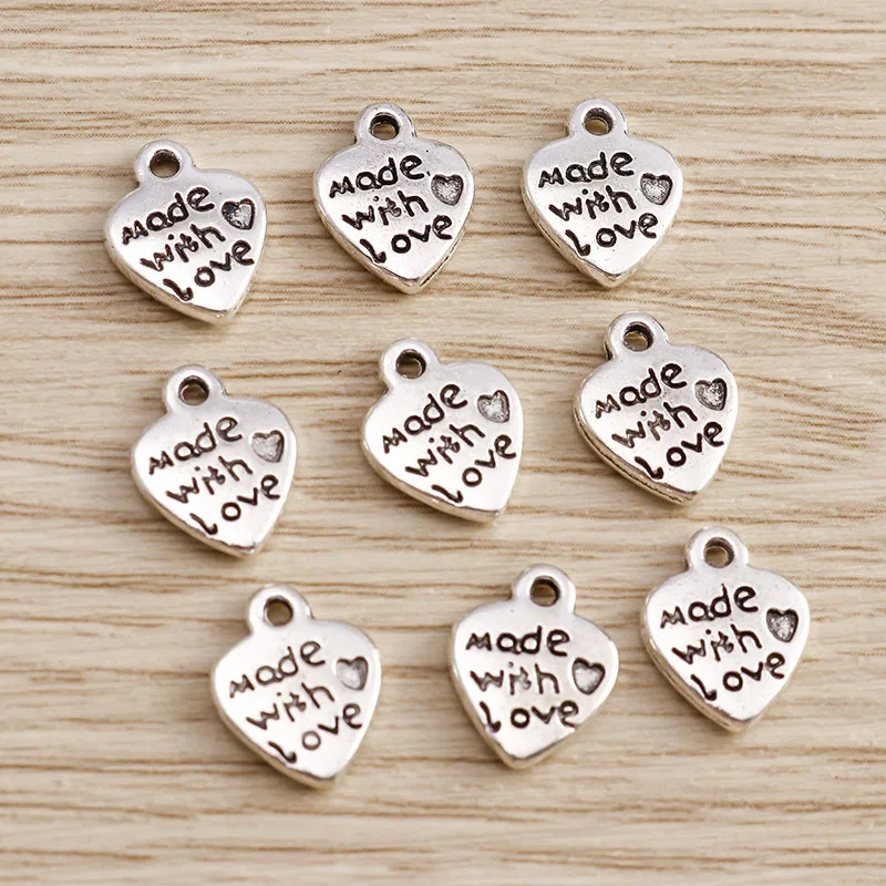 Tusember 50Pcs 10*12mm Alloy Metal Made with Love Hearts Charms for Pendants DIY Necklaces Earrings Jewelry Making Accessories
Tusember 50Pcs 10*12mm Alloy Metal Made with Love Hearts Charms for Pendants DIY Necklaces Earrings Jewelry Making Accessories