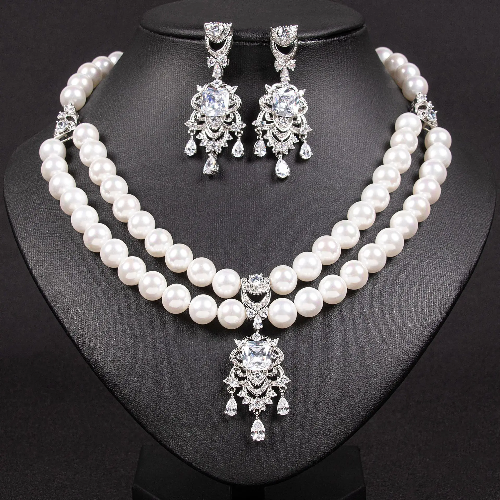 Bridal dress accessories pearl double-layer clavicle chain sparkling water-drop pearl earring necklace set
Bridal dress accessories pearl double-layer clavicle chain sparkling water-drop pearl earring necklace set