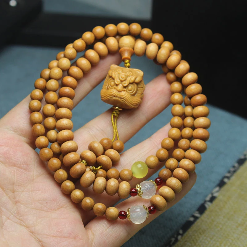 Indonesian Sandalwood Lion Dance Pendant Bracelet, Bead Strips + Round Beads with Fragrant Scent, Unisex Buddhist Beads
Indonesian Sandalwood Lion Dance Pendant Bracelet, Bead Strips + Round Beads with Fragrant Scent, Unisex Buddhist Beads