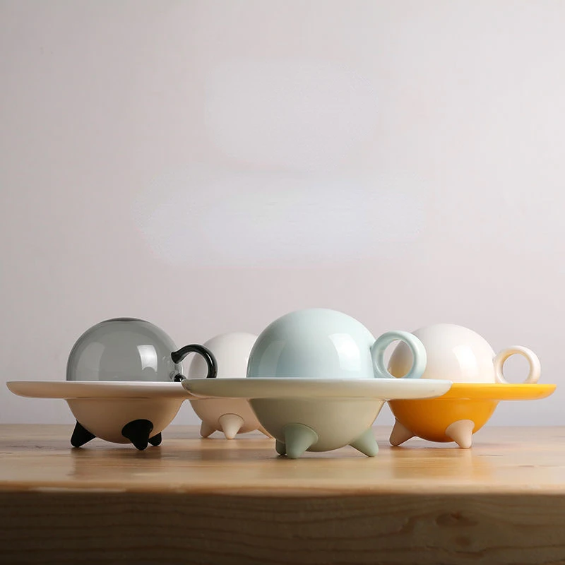 Creative Coffee Cup Afternoon Teacup And Saucer Set Simple Office Cup Coffee Portable Coffee Mugs Funny Inverted Design UFO Cup
Creative Coffee Cup Afternoon Teacup And Saucer Set Simple Office Cup Coffee Portable Coffee Mugs Funny Inverted Design UFO Cup
