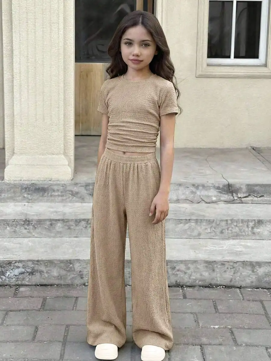 Beige Textured Knit Short Sleeve Crop Top And Wide Leg Pants Set Casual Summer Outfit
Beige Textured Knit Short Sleeve Crop Top And Wide Leg Pants Set Casual Summer Outfit