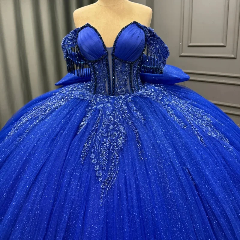 Shiny royal blue Quinceanera Dress Crystal Glitter Decal off-shoulder Lace Long tail Bow Vestidos De 15 Quinceanera Customize
Shiny royal blue Quinceanera Dress Crystal Glitter Decal off-shoulder Lace Long tail Bow Vestidos De 15 Quinceanera Customize