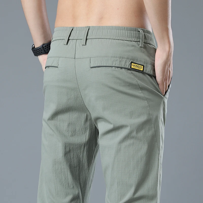 Summer Thin Straight Slim Casual Pants Men's Breathable Soft New Solid Color Elasticity Lace-up Waist Jogging Work Trousers Male
Summer Thin Straight Slim Casual Pants Men's Breathable Soft New Solid Color Elasticity Lace-up Waist Jogging Work Trousers Male